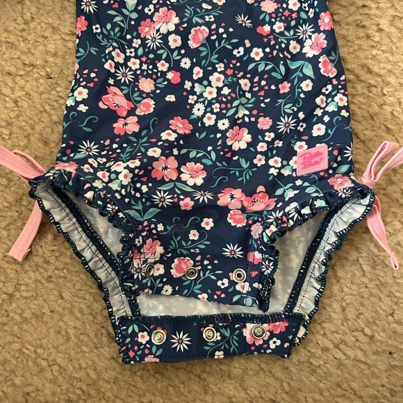 Ruffle Butts Moonlit Meadow one piece rash guard - Picture 3 of 4